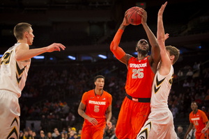 Rakeem Christmas finished with 18 points and six rebounds in No. 23 Syracuse's 66-63 win over Iowa on Friday night. 