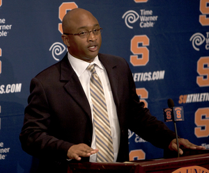 George McDonald, speaking here at his introductory press conference, has left Syracuse to become North Carolina State's wide receivers coach.