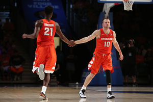 Cooney, who scored 19 points, high-fives Roberson