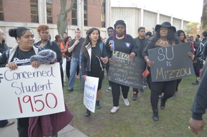 Members of the SU community rallied in solidarity with the protesters at the University of Missouri on Thursday.