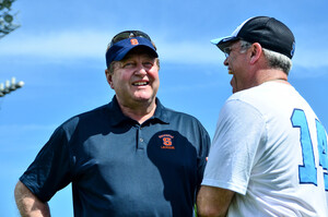 Syracuse head coach John Desko (left) is the winningest active head coach in lacrosse and won his second Atlantic Coast Conference title in a row on Sunday.