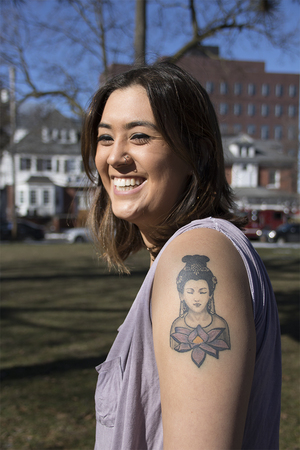Sarah Kulbersh, a senior geography major, got a tattoo of Guanyin, the Chinese goddess of mercy and compassion, on her arm to serve as inspiration for how to live her daily life.