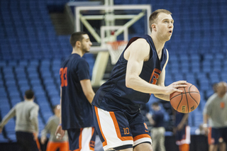 Trevor Cooney prepares to rise and shoot. The SU shooting guard looks to break out of a funk against the Broncos on Thursday.