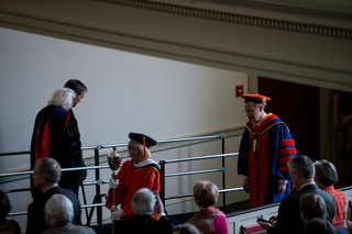 Chancellor Kent Syverud leaves Hendricks Chapel near the end of his inauguration ceremony on April 11, 2014.