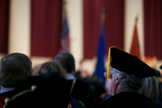 Audience members in academic regalia during the inauguration ceremony of Chancellor Kent Syverud on April 11, 2014.