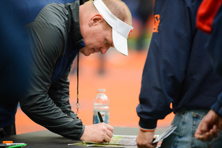 Shafer signs autographs for fans after the Spring Game.