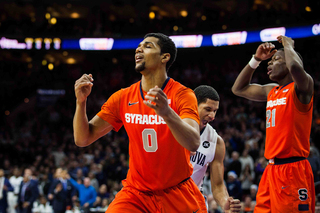 Gbinije and Roberson put their hands up in despair. The Orange eventually lost a game it once had a 15-point lead in.