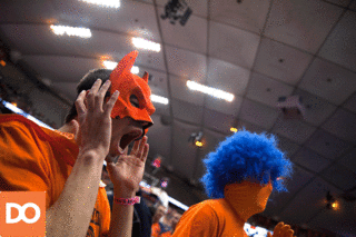 A pair of Orange fans look on during SU's game against Wake Forest on Tuesday night.