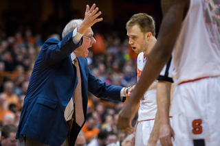 Jim Boeheim instructs Cooney during a stoppage of play. The head coach called it Cooney's worst game since he arrived at SU.