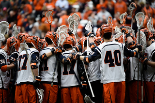 Syracuse huddles before its game against Duke. A season-high 11, 408 fans saw the Orange dismantle the Blue Devils on Sunday.