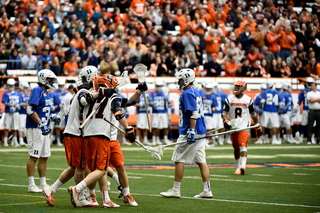 SU celebrates a late goal while Duke players stand stagnant in the background. At this point, the game was already decided.