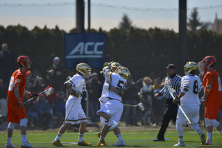 McDermott looks on as the Notre Dame offense celebrates another goal.