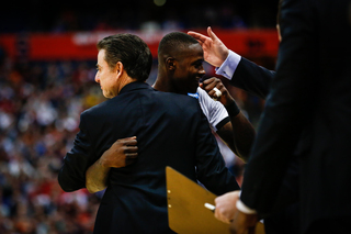 Rozier and Pitino embrace near the end of Louisville's Sweet 16 victory over N.C. State.
