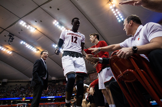 Mathiang takes the bench shortly in the first half during a break in play.