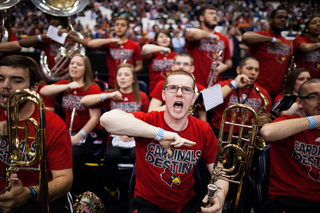 The Cardinals' pep band cheers on Louisville early in the first half of the team's match up against NCSU. 