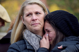 Joanne O’Brien hugs her daughter, Grace Rietta, following the Rose Laying Ceremony at the conclusion of Syracuse University’s Remembrance Week 2016. Joanne was friends with Nicole Boulanger, one of the 35 SU students who died in the Pan Am Flight 103 bombing. “I thought it was beautiful,” Joanne said, referencing her first time at SU for the Rose Laying Ceremony. “It’s still a huge loss.”
